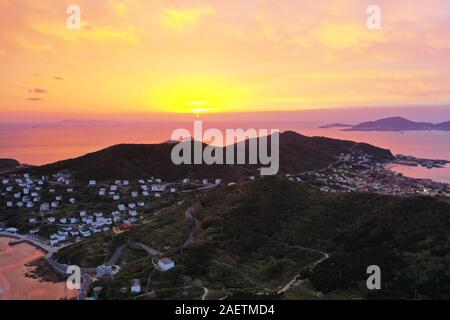 View of the sunrise in Shengsi Island in Zhoushan city, east China's Zhejiang province, 3 November 2019. Stock Photo