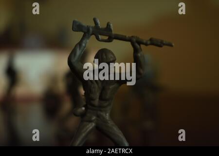 A Shot of a Toy Soldier Preparing to Attack a Target Stock Photo