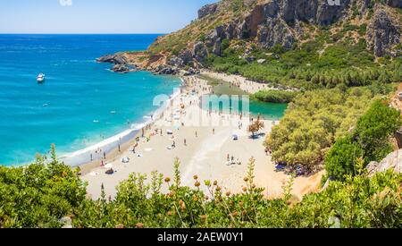 Panorama of Preveli beach at Libyan sea, river and palm forest, southern Crete , Greece Stock Photo