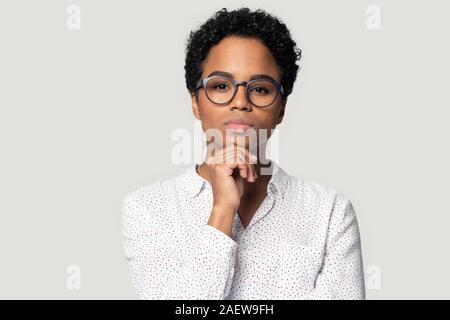 Thoughtful young african american female professional head shot portrait. Stock Photo