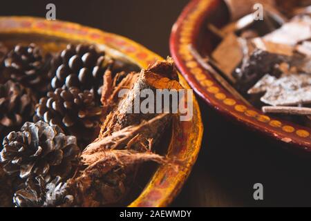 Christmas background, natural Xmas decoration, pine cones and wood Stock Photo