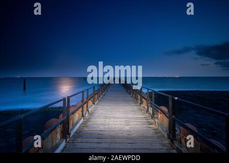 Wooden breakwater with jetty on the sandy beaches of Walcheren near the village of Westkapelle in Zeeland, the Netherlands Stock Photo