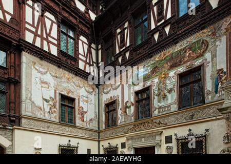 Peles Castle hand-painted murals and ornate fachwerk close-up, Sinaia, Romania Stock Photo