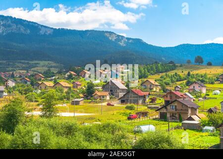 Mountain houses in plateau belong mountains. Stock Photo