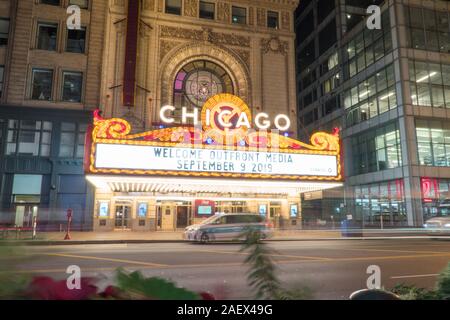 Chicago, IL - Circa 2019: Night time exterior establishing photo of Chicago Landmark Theatre located in loop section of downtown hosts concerts, plays Stock Photo