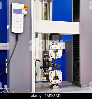 Universal electromechanical testing tensile machine Stock Photo - Alamy