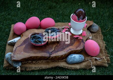 Asian Traditional Food, Pink Century eggs (Pidan Eggs) also known as preserved egg, hundred-year egg, thousand-year egg are a Chinese preserved food p Stock Photo