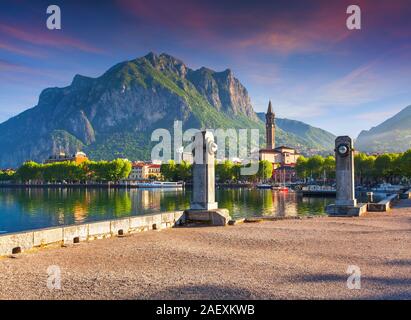 Typical italian village in the mountains. Italian village in Lecco Lake. Tower in Town Square in Lecco, Lake Lecco, Lombardy, Italy Stock Photo