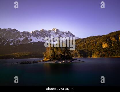 An image of the Eibsee and the Zugspitze in Bavaria Germany Stock Photo