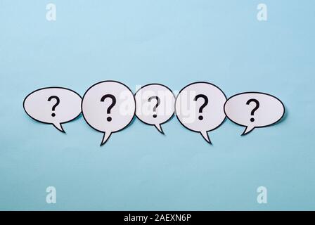 Line of question marks in speech bubbles Stock Photo