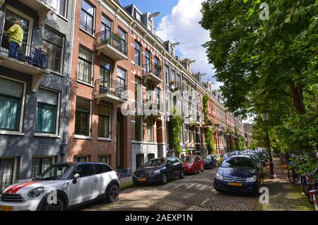 Amsterdam, Holland, August 2019. Along the river Amstel, on the outskirts of the city it is easy to meet side streets whose appearance has a strong ap Stock Photo