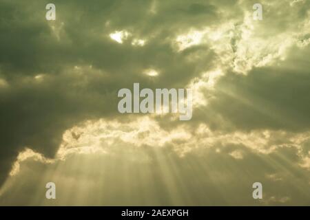 divine sky with clouds and rays of sun from behind it Stock Photo