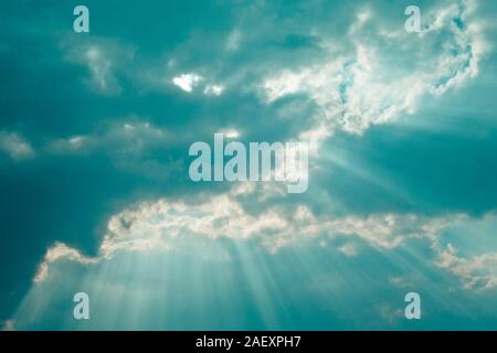 divine sky with clouds and rays of sun from behind it Stock Photo