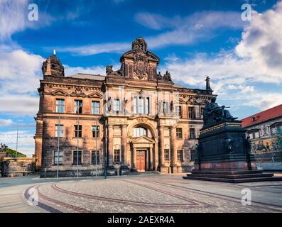 Sunny cityscape of Dresden with Court of Appeal and statue of Frederick Augustus. Summer morning in capital of Saxony, Germany, Europe. Artistic style Stock Photo