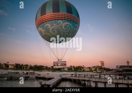 Orlando, Florida. November 29, 2019. Air balloon flying and colorful buildings in Lake Buena Vista Stock Photo