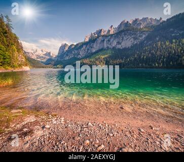 Sunny summer morning on the Gosau Lake (Vorderer Gosausee) with view of Hoher Dachstein and Gosau glacier. Colorful outdoor scene in Upper Austrian Al Stock Photo