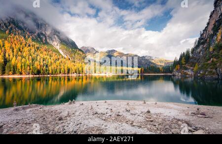 Beautiful morning on Braies Lake. Colorful autumn landscape in Italian Alps, Naturpark Fanes-Sennes-Prags, Dolomite, Italy, Europe. Stock Photo
