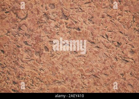 Red and Orange antique Stone Texture with dent and scratches. Stone Texture of medieval fortress wall Stock Photo