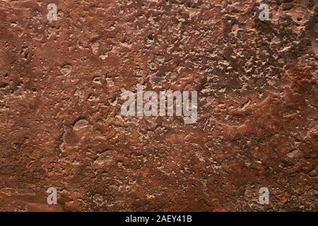 Red and Orange antique Stone Texture with dent and scratches. Stone Texture of medieval fortress wall Stock Photo