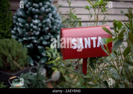 Christmas, red mailbox with letters to Santa Claus