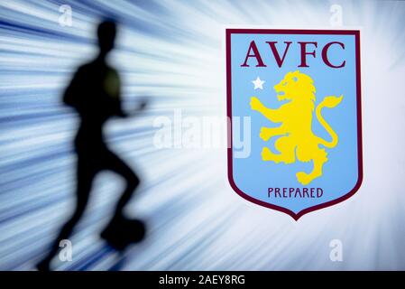 LONDON, ENGLAND, JULY. 1. 2019: Aston Villa Football club logo, Premier League, England. Soccer player silhouette. Stock Photo