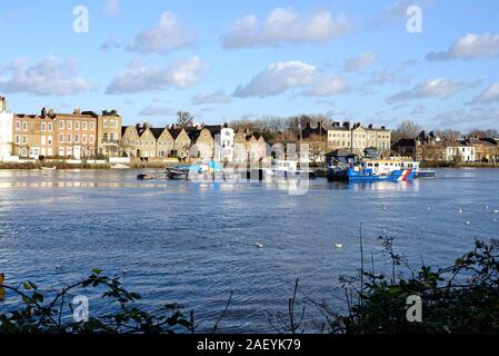 Looking across the River Thames to Strand On The Green, Chiswick West London England UK Stock Photo