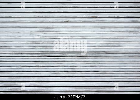 Weathered old Light gray blind made of wood Stock Photo
