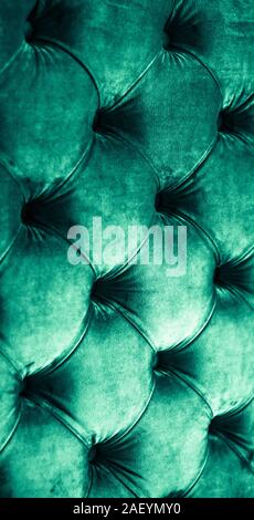Furniture design, classic interior and royal vintage material concept - Emerald luxury velour quilted sofa upholstery with buttons, elegant green home Stock Photo