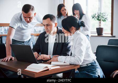 Business people and manager working on their new project in classroom Stock Photo