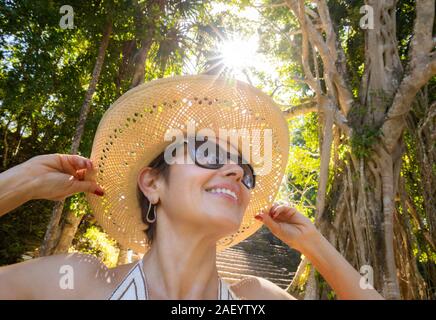 A female tourist at the Mayan ruins of Chaacchoben, Quintana Roo, Mexico. Stock Photo