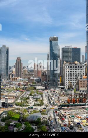 This view of Manhattan was captured from the top of  'The Vessel' at The Hudson Yards in New York City during a clear sunny day. Stock Photo