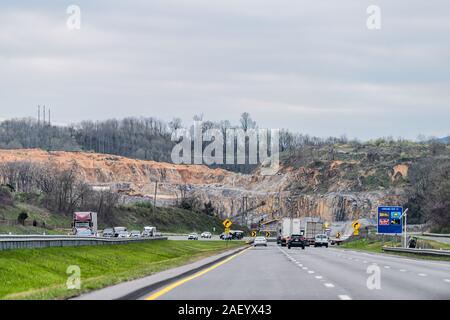 Wytheville, USA - April 19, 2018: Cars trucks driving on Interstate highway road 81 south in Virginia with signs for exit Stock Photo