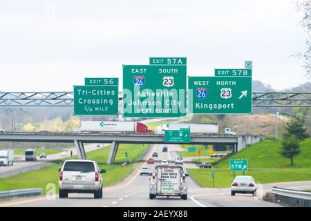 Bristol, USA - April 19, 2018: Asheville and Johnson City exit sign on highway in Tennessee on interstate 81 with cars on road Stock Photo