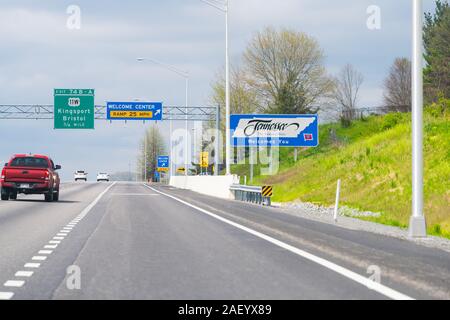 Bristol, USA - April 19, 2018: Welcome Center exit sign on highway in Virginia on interstate 381 and Tennessee text with cars on road Stock Photo