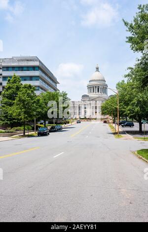 Little Rock, USA - June 4, 2019: State Capitol of Arkansas on sunny summer day with street road and cars parked Stock Photo