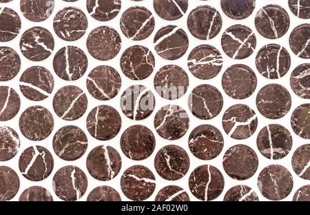 Ceramic tiles with voluminous brown circles. Tile Background. Stock Photo