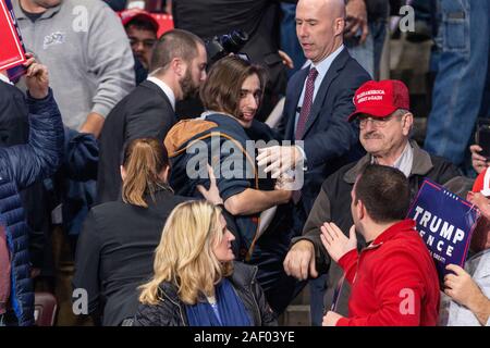 Hershey, PA - December 10, 2019: Anti-Trump protester removed by security personnel from President of USA Donald Trump holds Keep America Great rally at Giant Center Stock Photo