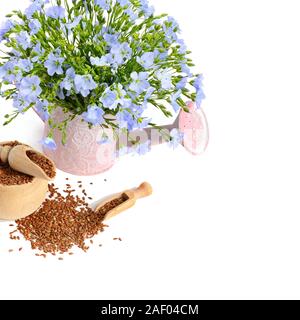 flax seeds and flowers isolated on white background Stock Photo