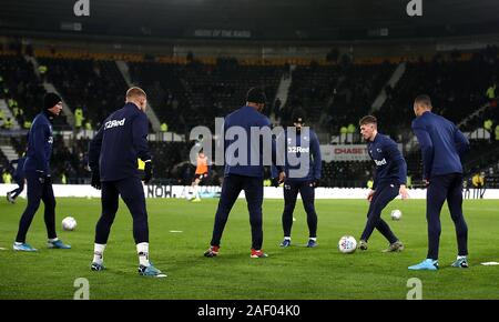 Derby County's Max Bird (second right) during warm-up before the Sky Bet Championship match at Pride Park, Derby. Stock Photo