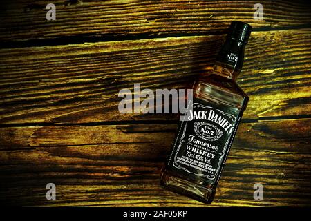 Tanakajd, Hungary - 112. 11. 2019 : Bottle of Jack Daniel's whiskey on weathered wooden background . Stock Photo