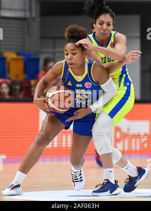 From left MAXUELLA MBAKA of Castors Braine and CRISTINA OUVINA of USK in action during the Women's Basketball European League 7th round group A game: USK Praha vs Castors Braine (Belgium) in Prague, Czech Republic, December 11, 2019. (CTK Photo/Michal Kamaryt) Stock Photo