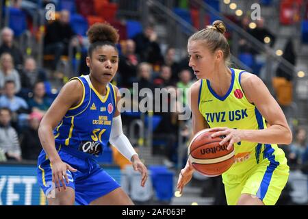 From left MAXUELLA MBAKA of Castors Braine and KATERINA ELHOTOVA of USK Praha in action during the Women's Basketball European League 7th round group A game: USK Praha vs Castors Braine (Belgium) in Prague, Czech Republic, December 11, 2019. (CTK Photo/Michal Kamaryt) Stock Photo