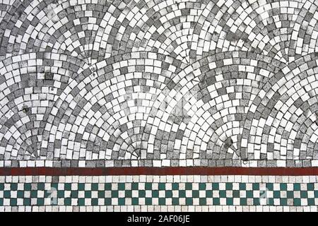 Very old pavement made from cobble stone Stock Photo