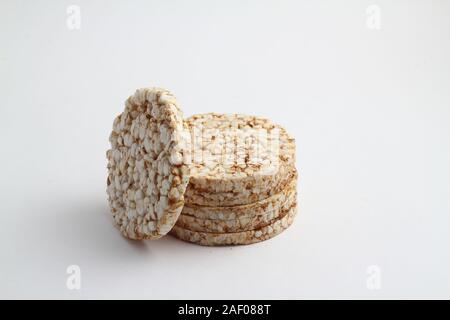 Dried diet crispy ctrial round bread isolated on white background. Diet food Stock Photo