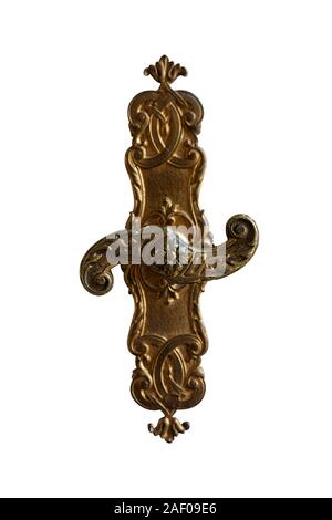 side view detail of vintage antique golden window handle knob lock with metallic carvings isolated on white background Stock Photo