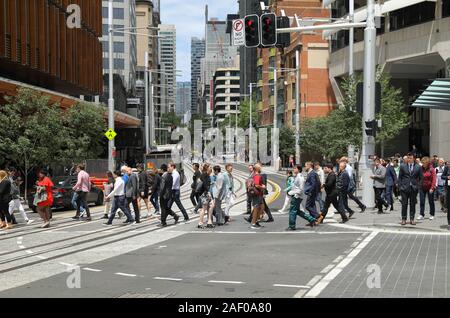 Sydney city centre and Louis Vuitton store with pedestrains crossing the  intersection at George and Market streets,Sydney,Australia Stock Photo -  Alamy