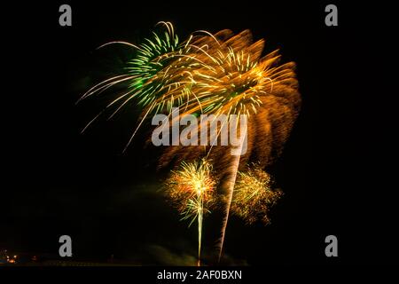 Bright colourful exploding fireworks on a black background Stock Photo