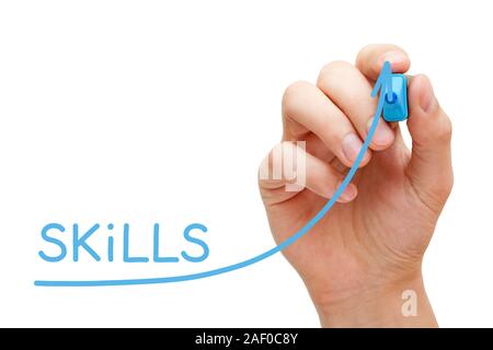 Hand drawing growing Skills graph with blue marker on transparent wipe board isolated on white background. Stock Photo