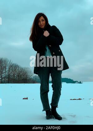 Super portrait of a woman in the snow Stock Photo