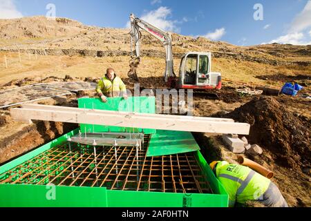 work starts on the initial groundworks for 3 wind turbines to be constructed behind the kirkstone Pass Inn on kirkstone Pass in the Lake District, UK. Stock Photo